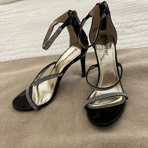 Rhinestone 3 inch heels with straps and hold details.